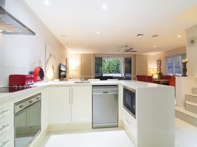 Whispering Palms Luxury Port Douglas Accommodation well equipped kitchen
