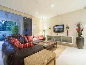 Plantation House 2 luxury holiday rental Port Douglas living room park and sea view