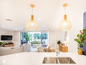 Amaroo beachfront Luxury Holiday Rental Port Douglas kitchen living view