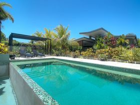 Tranquility by the Lake Luxury Port Douglas Accommodation sunny pool 