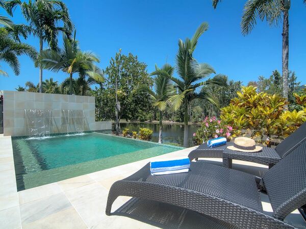 Tranquility by the Lake Luxury Port Douglas Accommodation pool side